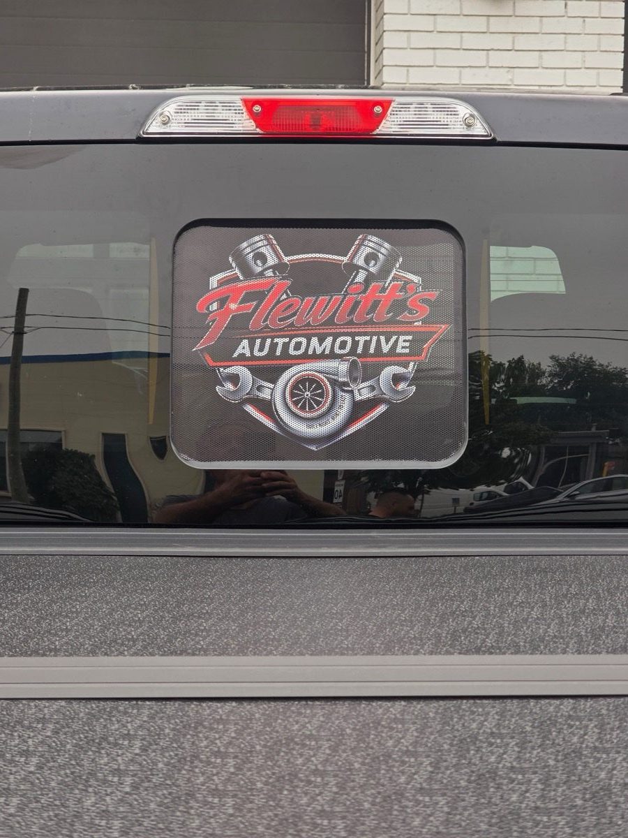 Flewitt's Automotive logo on the shop truck